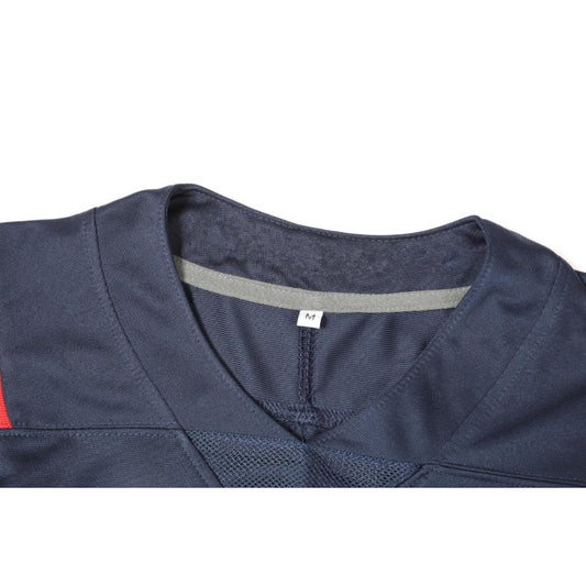 Close-up of  Men's Navy Blue Football Jersey with a gray collar and a visible brand tag on a white background.