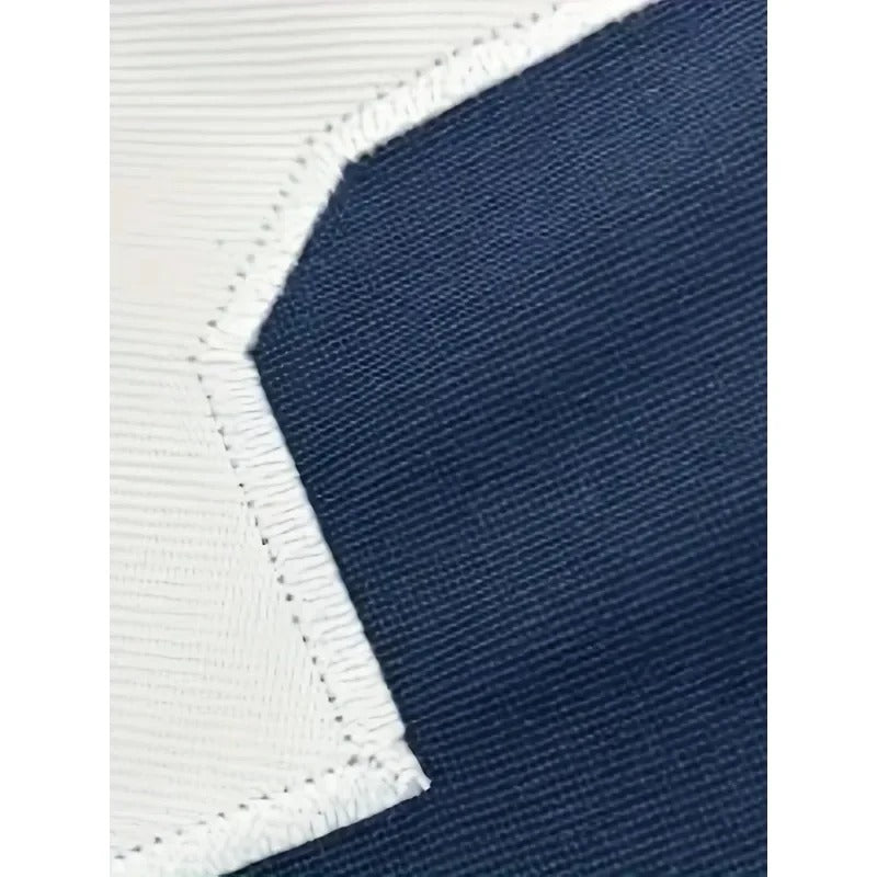 Close-up of blue fabric with white stitching detail of Navy Football Jersey Gameday Gear for Dallas Fans"