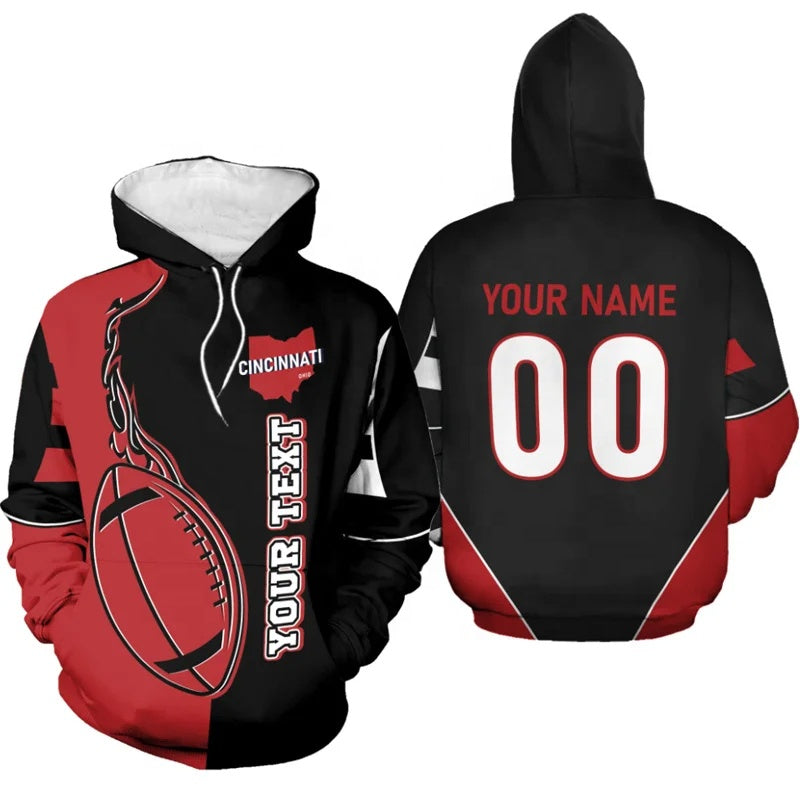 Personalized black and red Cincinnati football hoodie featuring a flaming football design with custom name and number on the back
